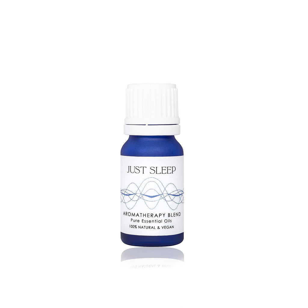 Essential oils for sleep from Elan Skincare, Aromatherapy Blend of pure essential oils in a blue 10 ml bottle
