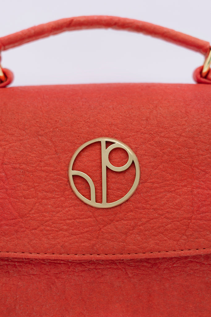 Red Luxury Handbag from The Positive Company Sustainable Marketplace. Made with ethical materials by Scandinavian Luxury Brand 1 People