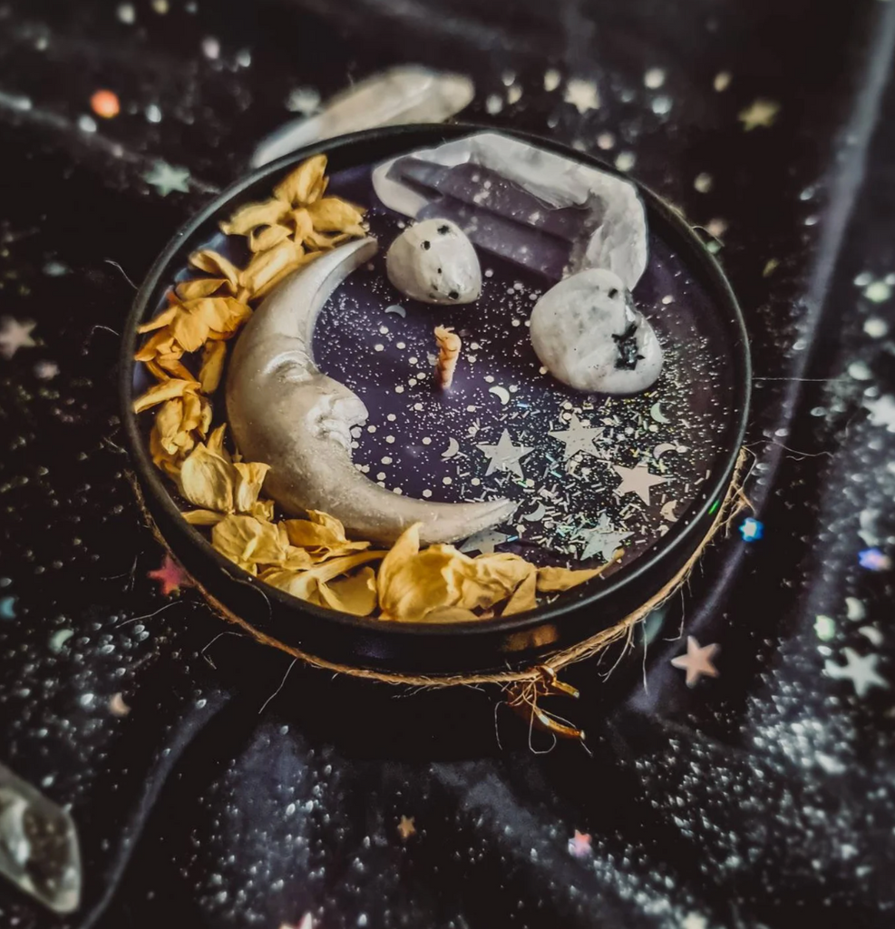 reiki infused candle with moonstone