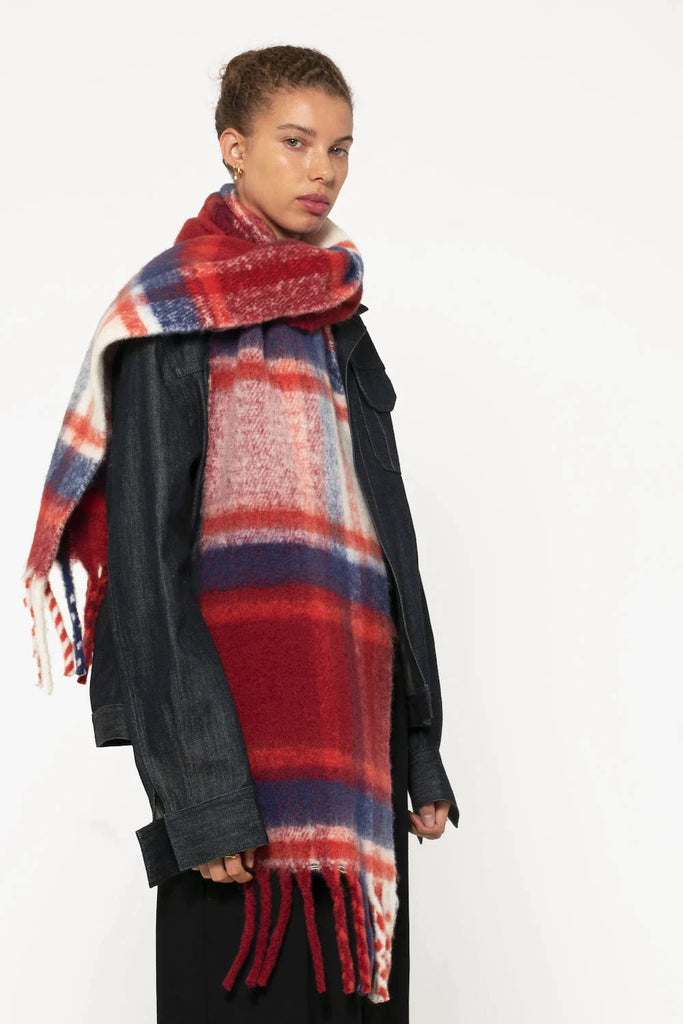 lareg red scarf woman wearing oversized red & navy plaid scarf with soft fluffy material