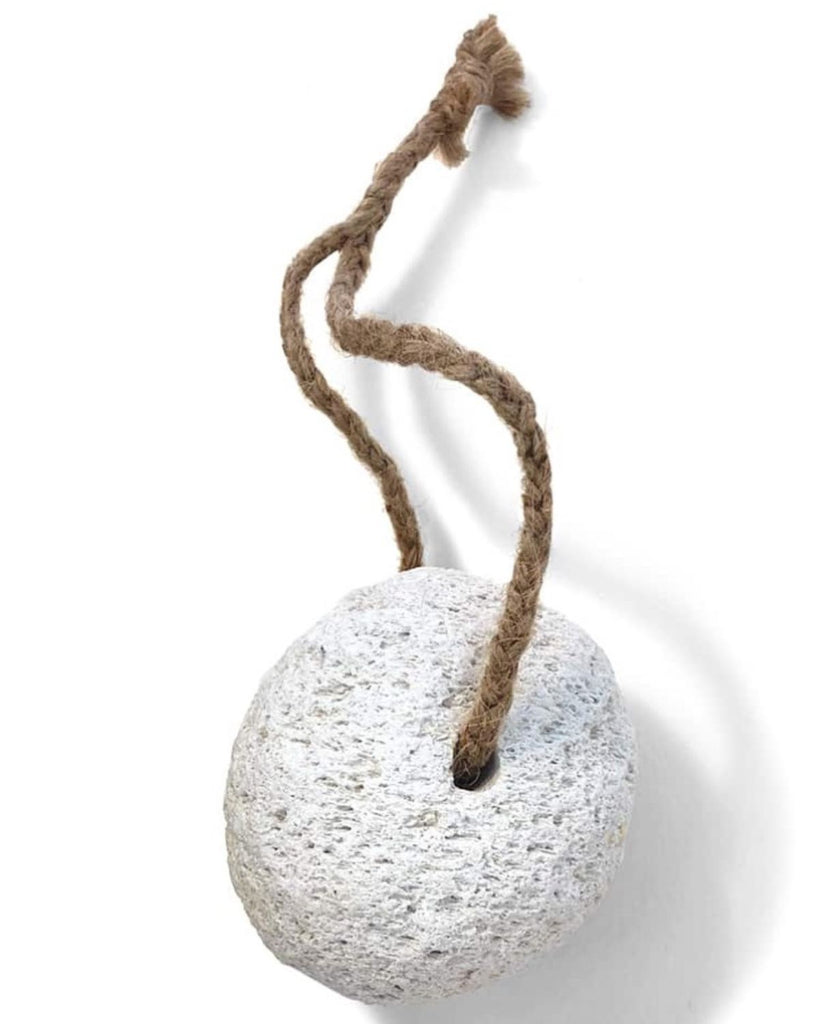 Natural pumice stone with hand plaited cord.  A plastic free bathroom accessory for smooth soft feet.  Remove hard and unsightly skin the most natural way.  Perfect gift for the eco conscious consumer, made from 100% natural volcanic pumice and jute fibres. Suitable as a vegan zero waste gift too!  Light and porous rock Jute twine, hand plaited. Plastic free …. not even sticky tape!