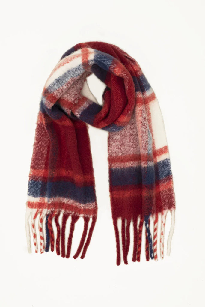 large red vegan scarf -flat lay image of red, white and blue plaid scarf with tassels