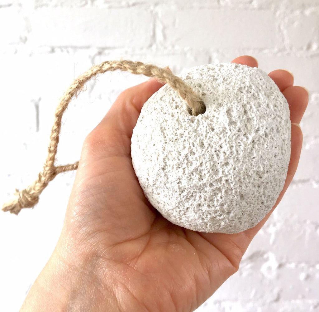 Natural pumice stone with hand plaited cord. A plastic free bathroom accessory for smooth soft feet. Remove hard and unsightly skin the most natural way. Perfect gift for the eco conscious consumer, made from 100% natural volcanic pumice and jute fibres. Suitable as a vegan zero waste gift too! Light and porous rock Jute twine, hand plaited. Plastic free …. not even sticky tape!