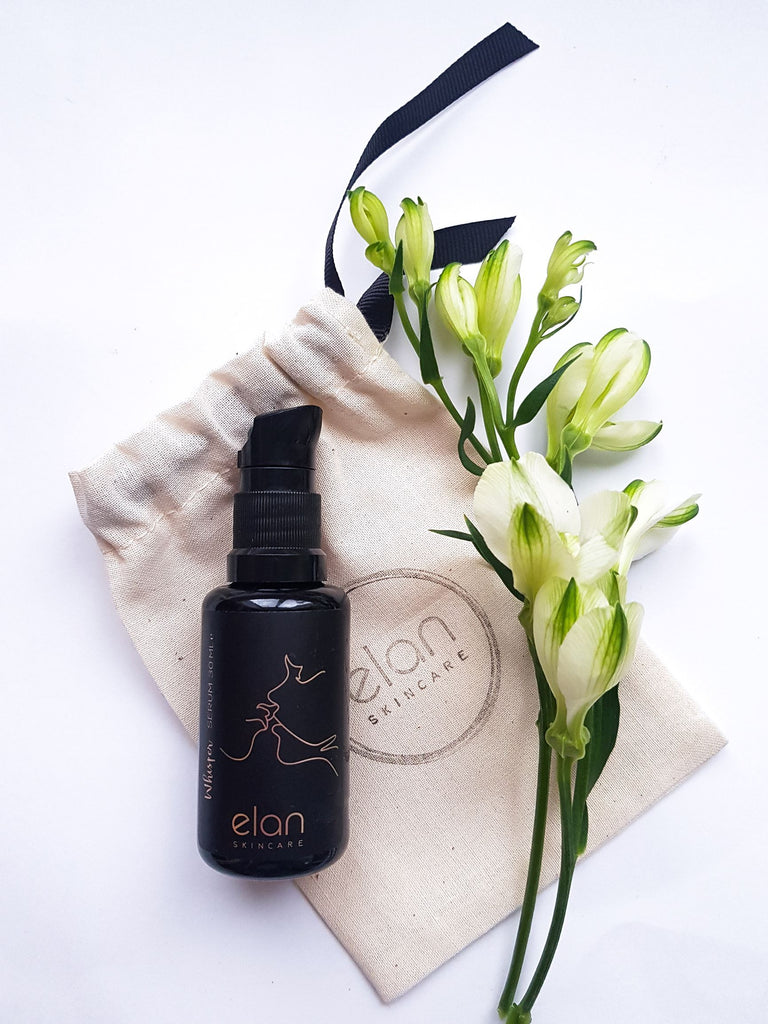 Whisper Serum Organic Face Oil on a cotton bag from Elan Skincare